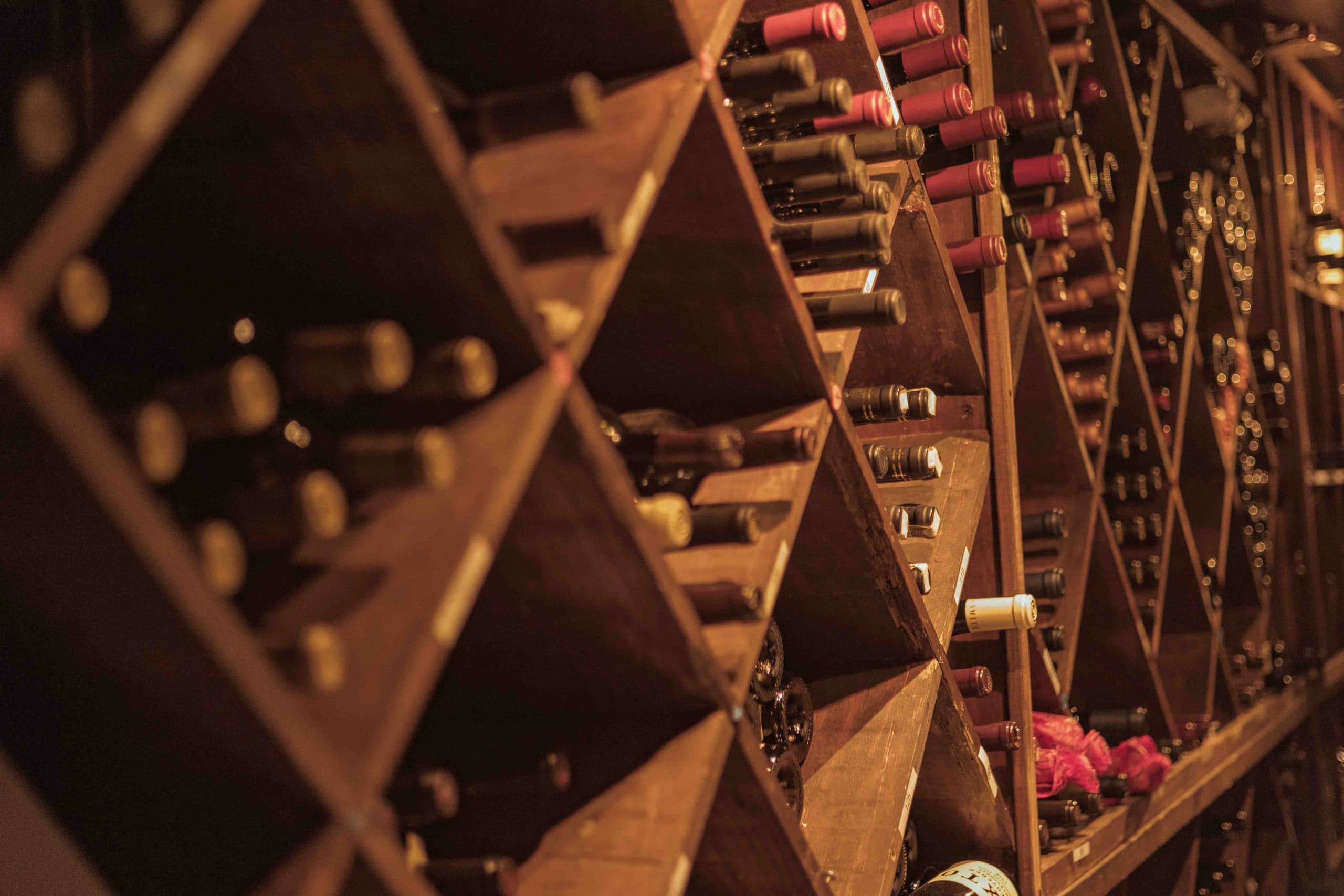 Wine bottles displayed in Nico’s cellar